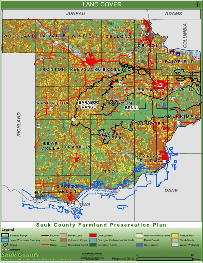 Map of Sauk County color-coded for current land cover. The map is based on the Farmland Preservation Plan geospatial analysis of the county and gives a detailed representation of different types of natural ecosystems and developed land areas. 