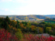 Photograph of the Driftless Area in Wisconsin. The picture displays the relatively hilly topography and diverse vegetation of the area.