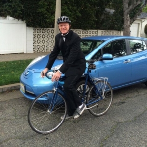 Actor Ed Begley, Jr. riding his bicycle to the Oscars in a tuxedo