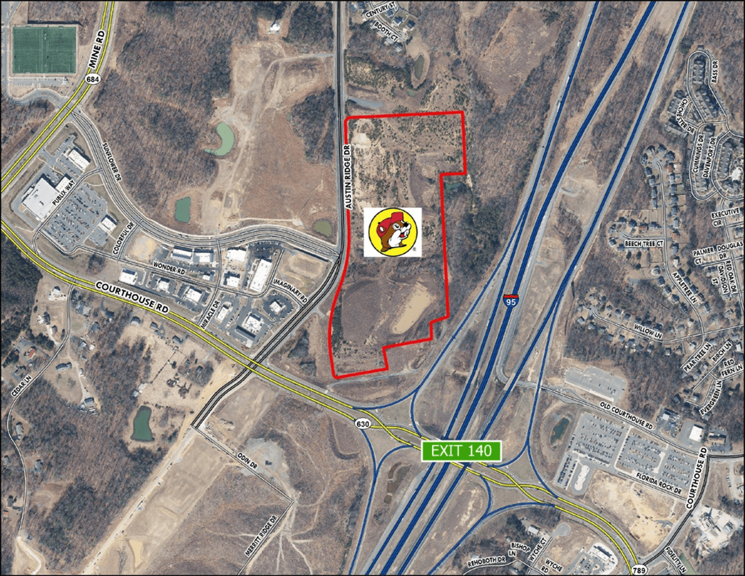 A large swath of land, where Buc-ee's is proposed to go, is outlined in red in the center of the map, northwest of exit 140.