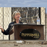 an image of Karen Budd-Falen speaking at a podium is laid over an image of a barren landscape with cattle in the distance