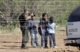 Photo of a border patrol police officer and migrant children