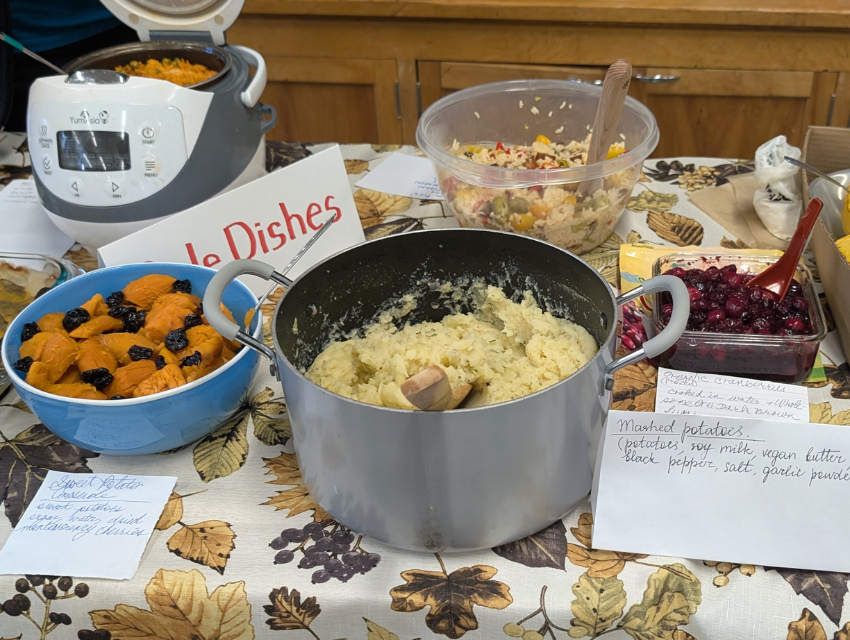 a table full of colorful and diverse vegan dishes