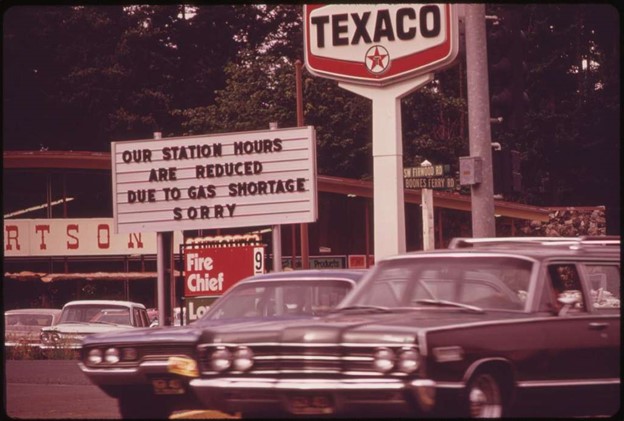 1970s cars at a Texaco gas station during the gas shortage