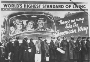 people in bread line in front of a billboard promoting prosperity
