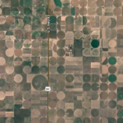 center-pivot irrigation Satellite image of a huge swath of land full of crop circles created from center-pivot irrigation.