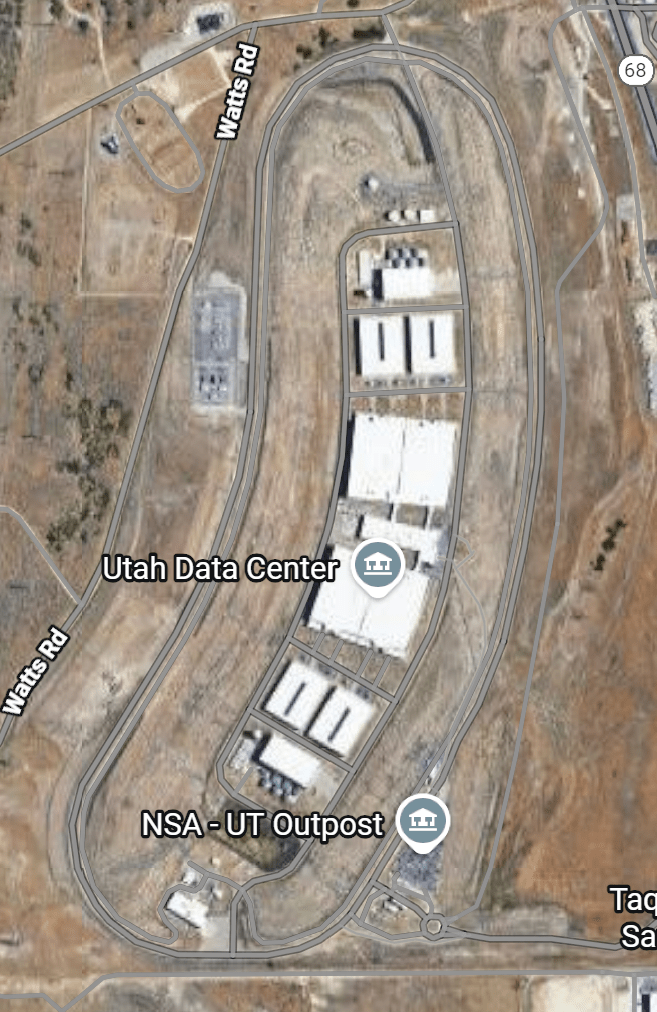A satellite image of a sprawling, white compound in the middle of a tan, arid field.